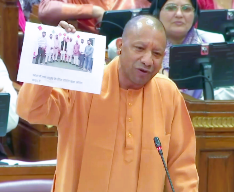 CM Yogi shows a pic of Amit Yadav, accused in the codeine case, with SP chief Akhilesh Yadav in the House, also confirms no deaths from toxic syrup in UP